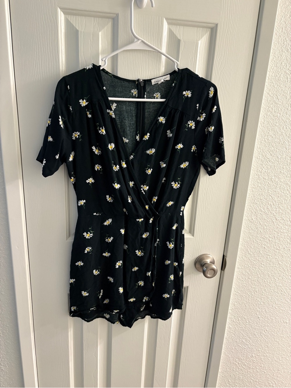 Socialite Black Floral Faux Wrap Romper with White and Yellow Daisies